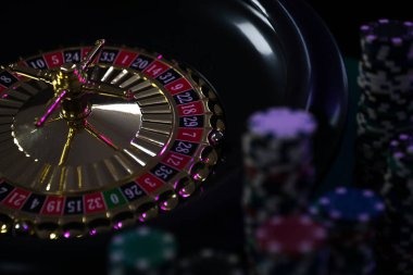 Live baccarat table with dealing shoe and card placement